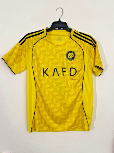 Ronaldo nassr home jersey - al,